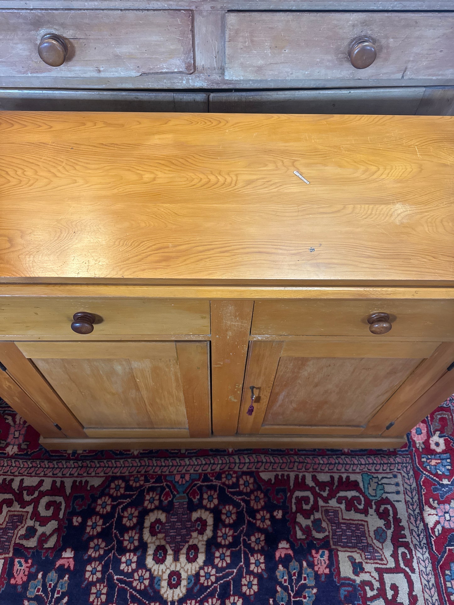 Antique pine cabinet with drawers and storage
