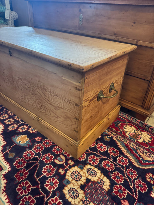 Antique raw pine trunk with brass handles