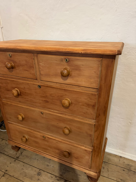 Lovely pine chest of drawers with brass escutcheons