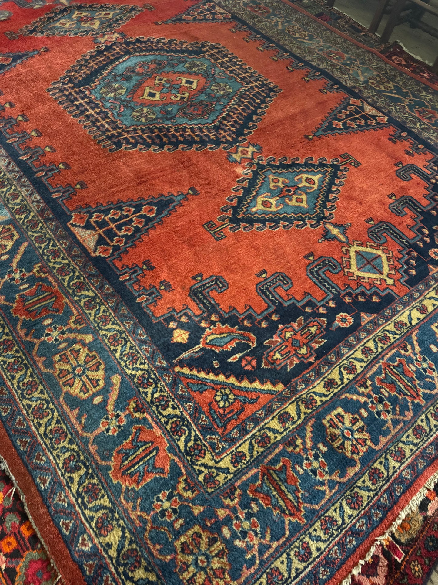 Persian rug navy and rust colours