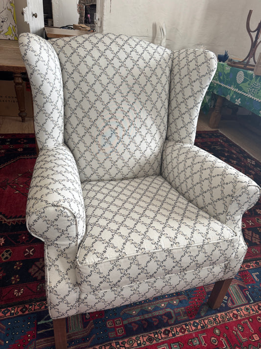Wingback armchair with pretty upholstery