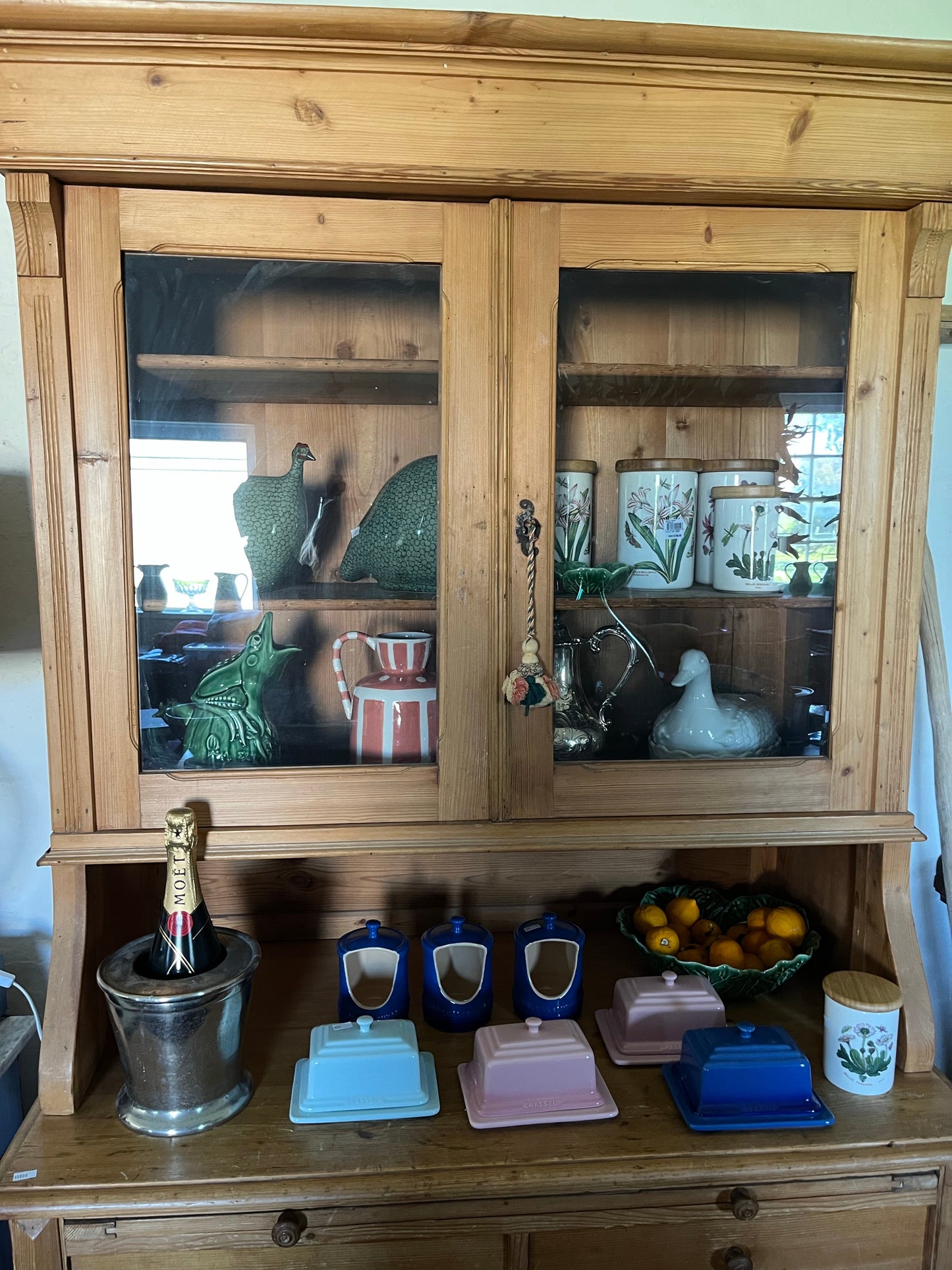 Old pine dresser with glass doors