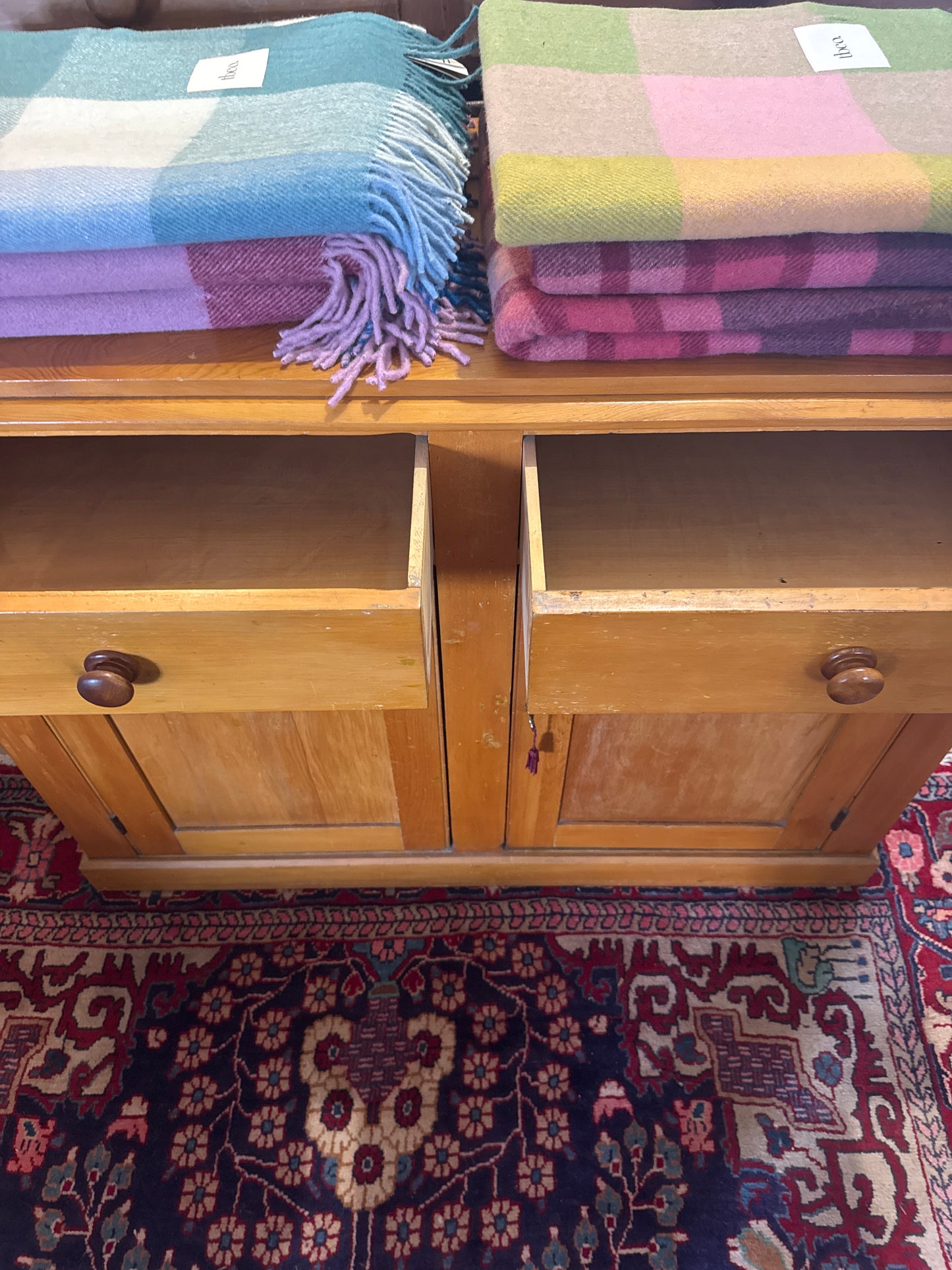 Antique pine cabinet with drawers and storage