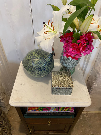 A pair of French oak marble topped bedsides
