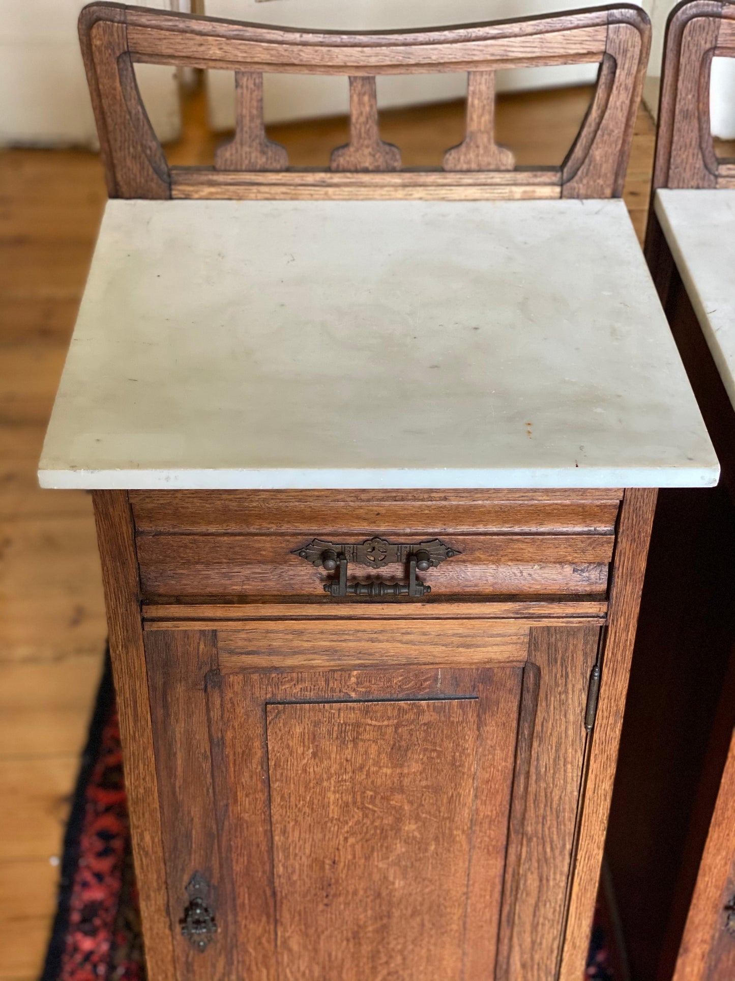 Pair of antique French oak nouveau bedsides