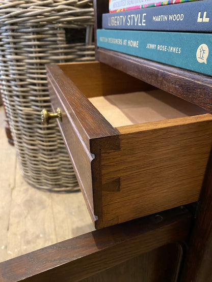 A pair of French oak marble topped bedsides