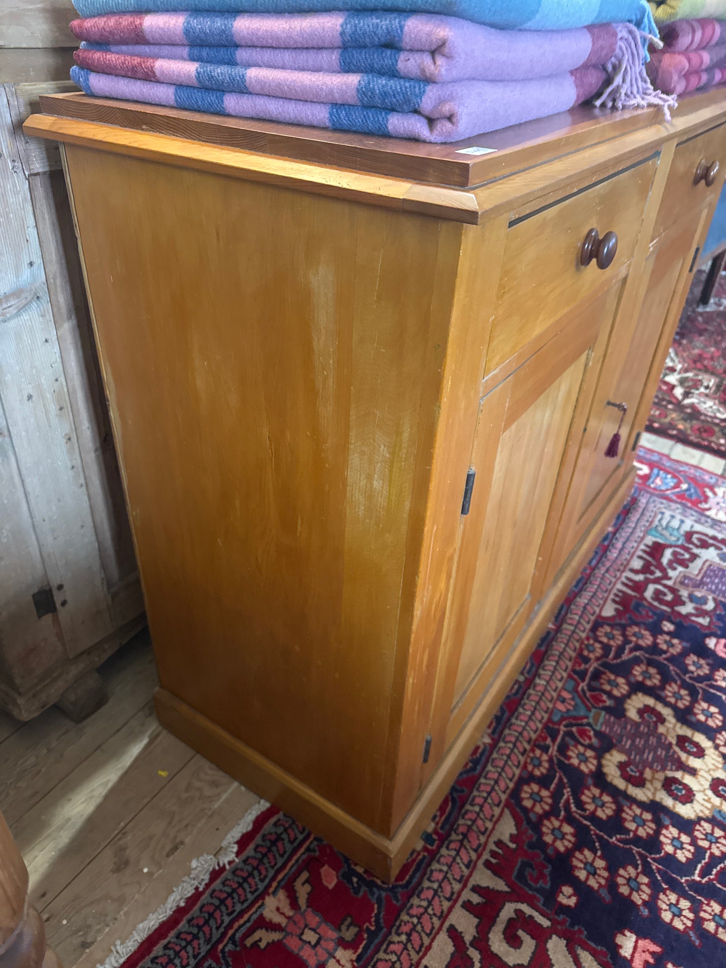 Antique pine cabinet with drawers and storage