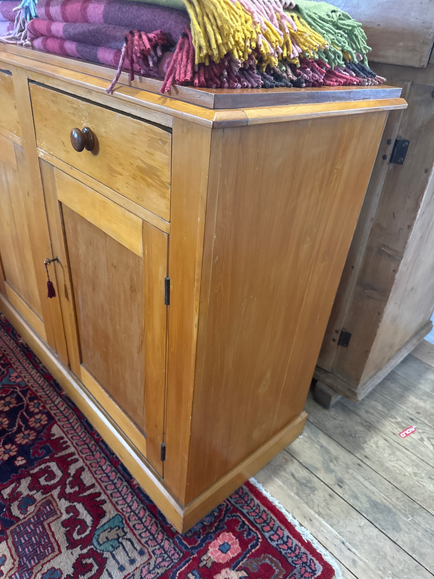 Antique pine cabinet with drawers and storage