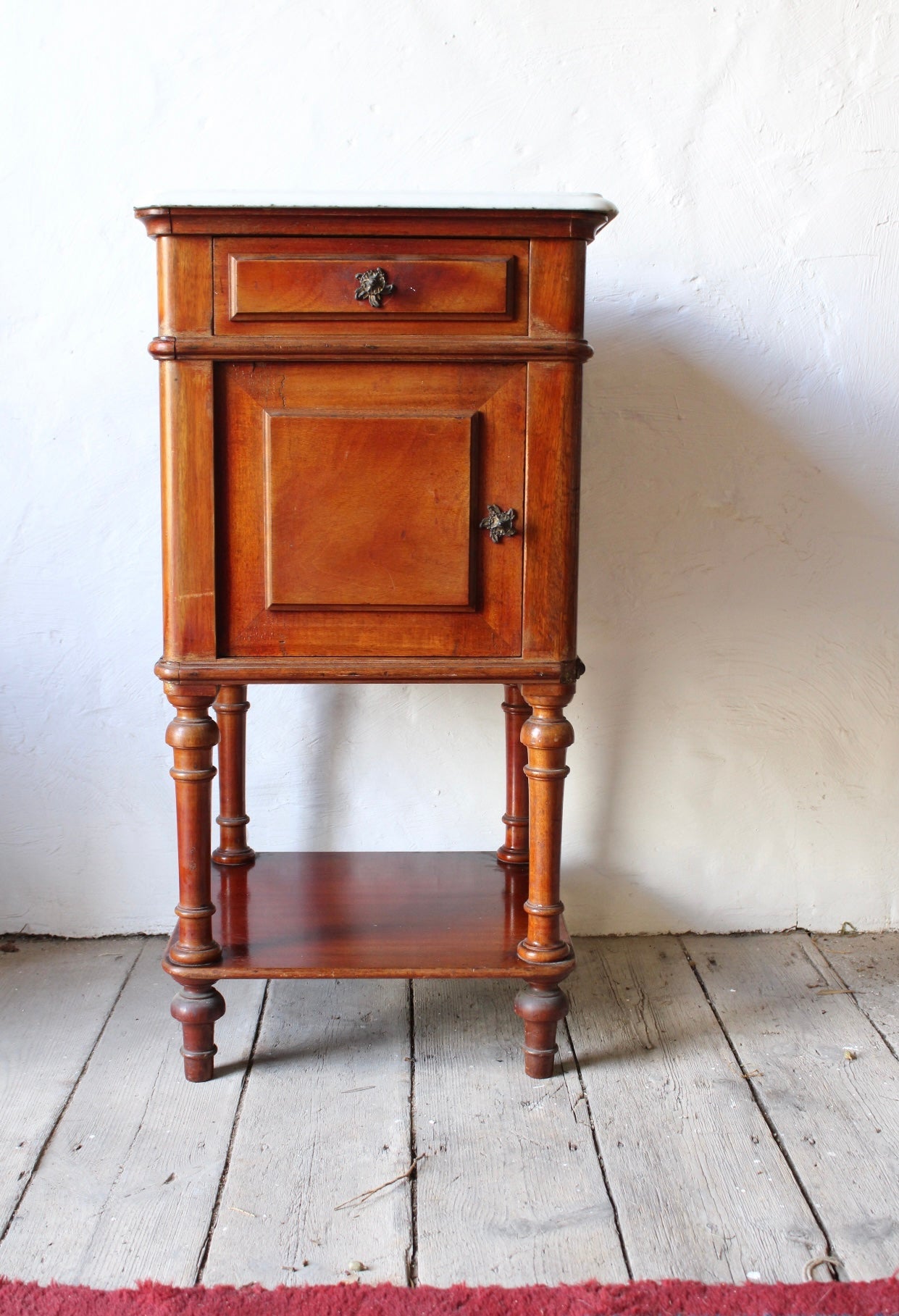 A single French antique marble topped cedar pot cupboard