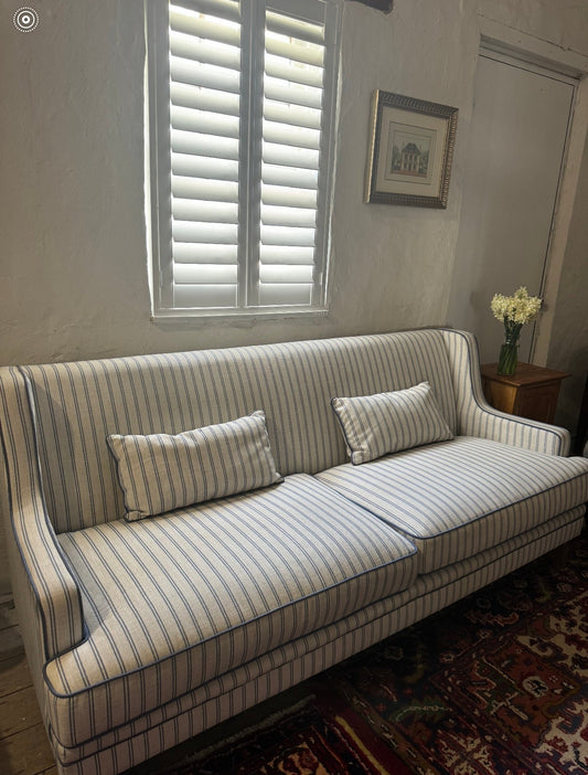 Blue striped three seater sofa