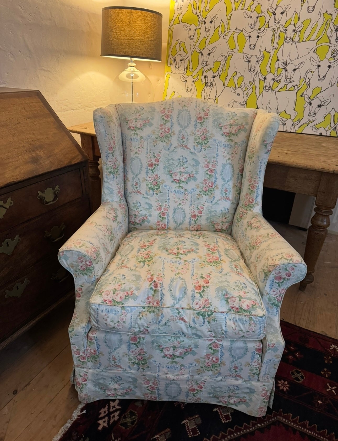 Vintage wingback floral armchair