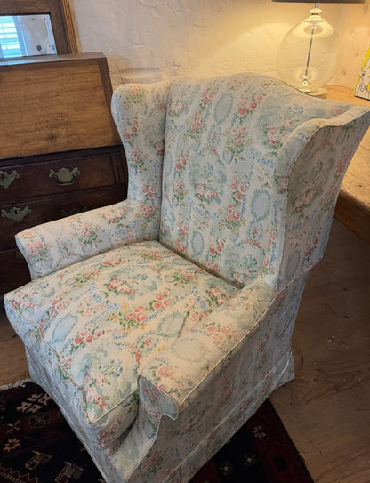 Vintage wingback floral armchair