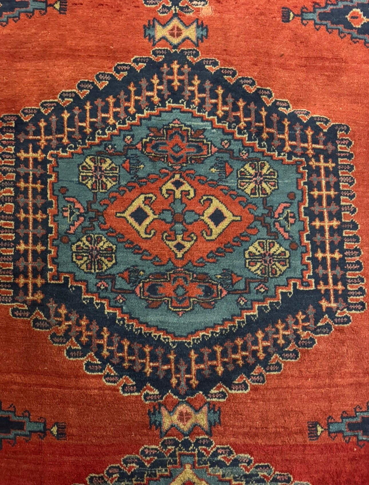 Persian rug navy and rust colours