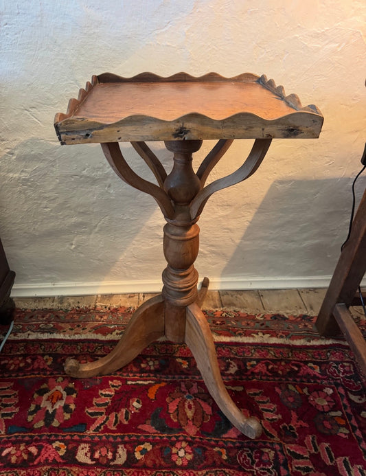 Scalloped edge wine table