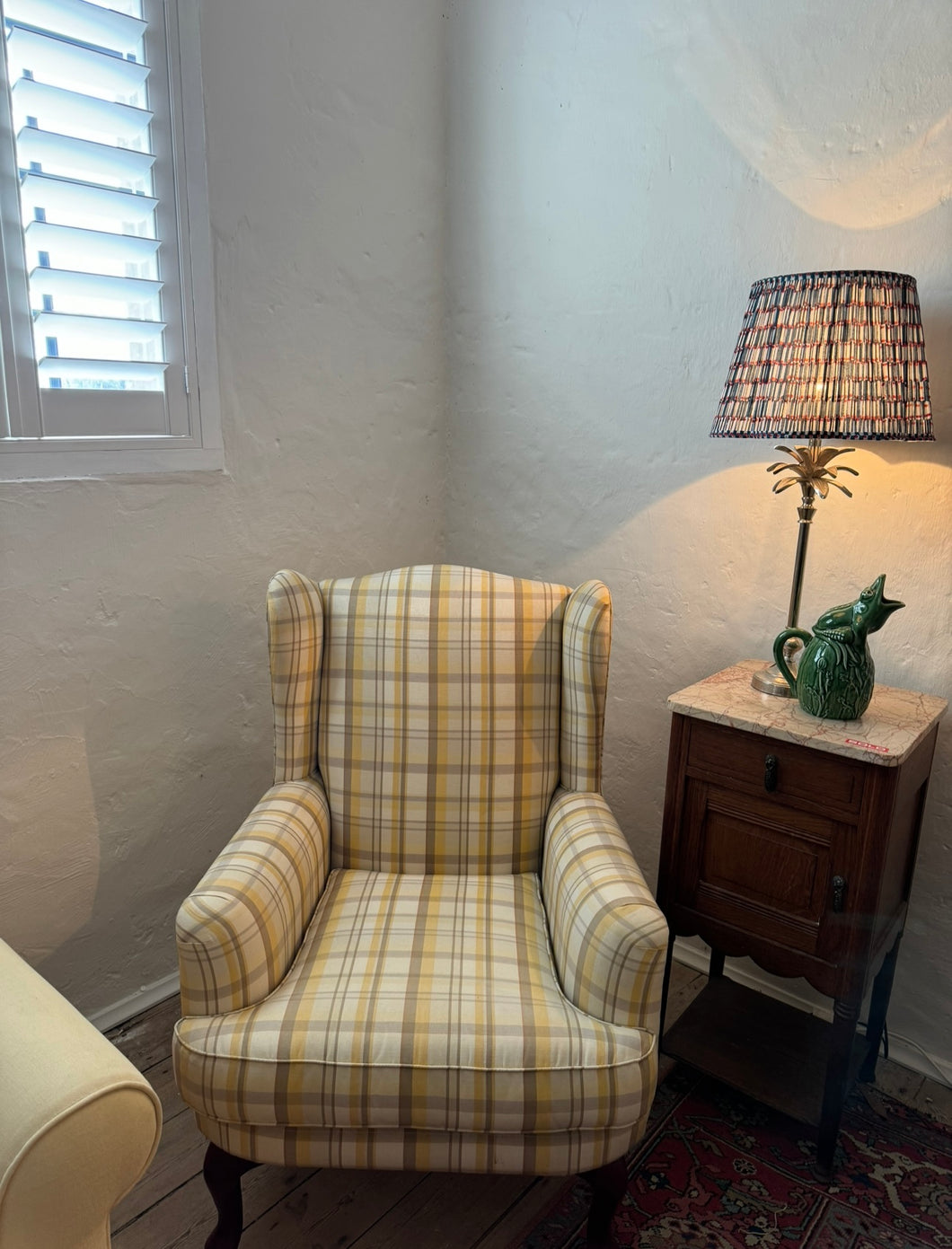 Beautiful yellow wingback chair