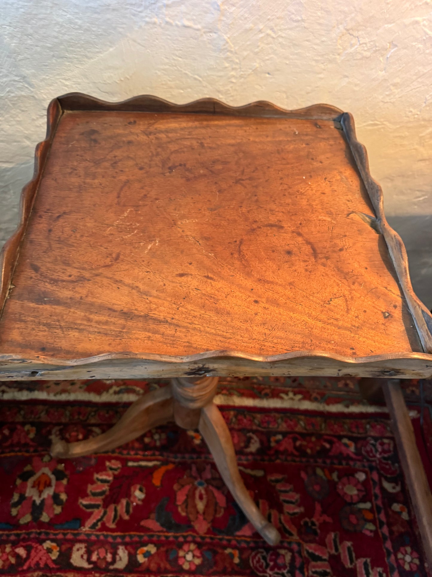 Scalloped edge wine table
