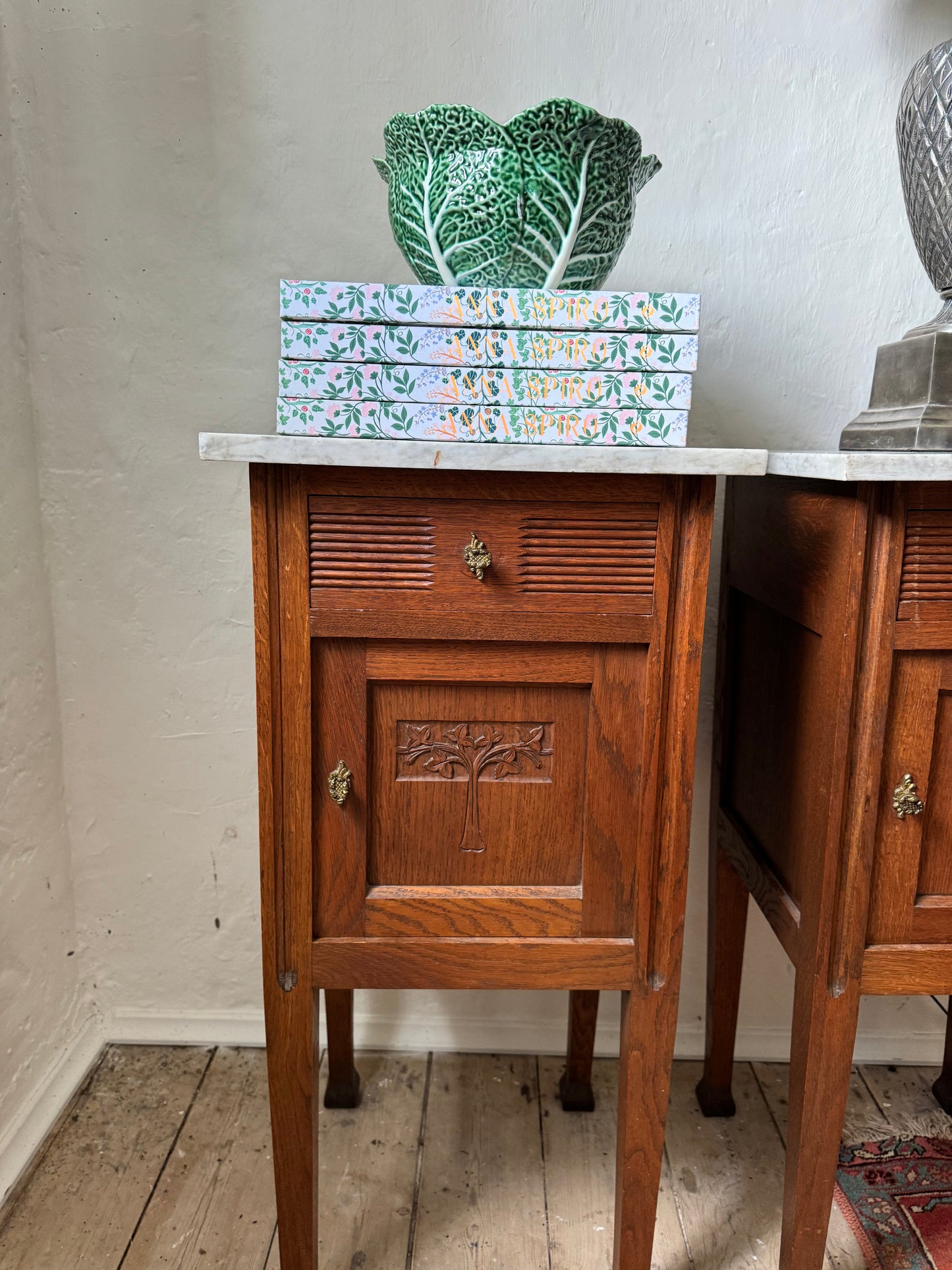French oak bedsides with marble tops