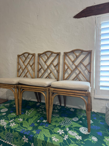 Four bamboo dining chairs with seats