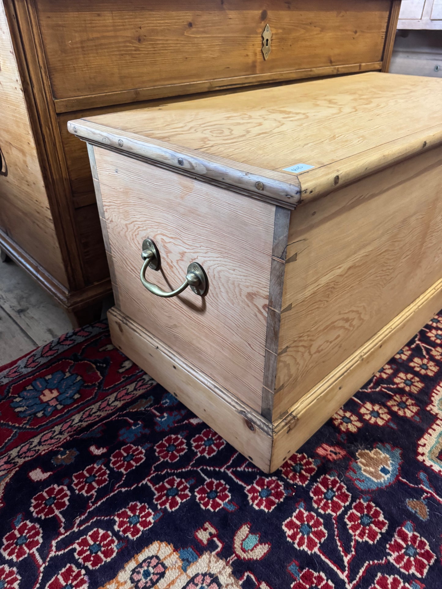 Antique raw pine trunk with brass handles