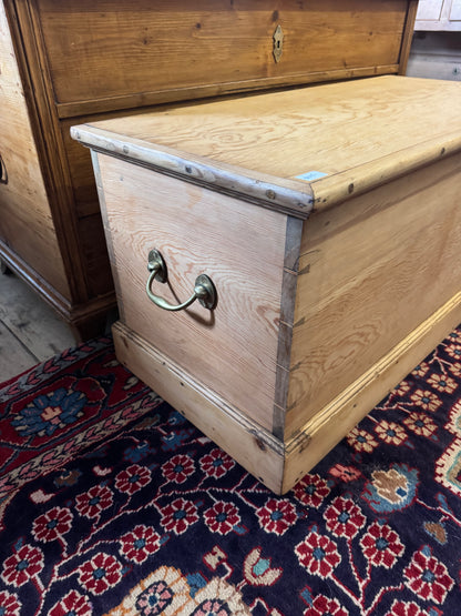 Antique raw pine trunk with brass handles