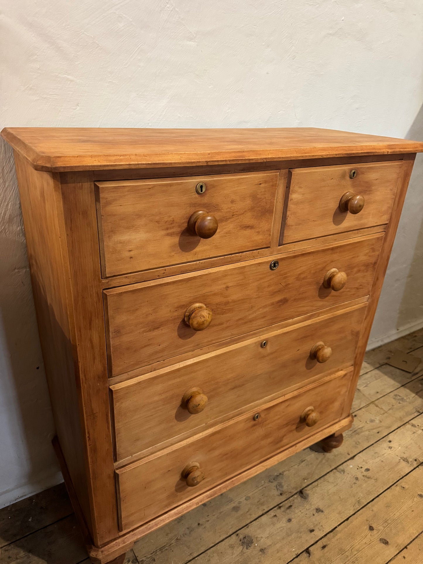 Lovely pine chest of drawers with brass escutcheons