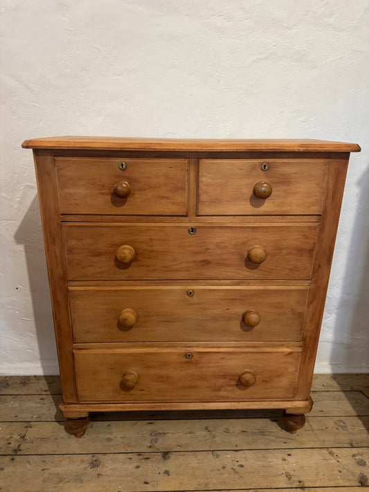 Lovely pine chest of drawers with brass escutcheons