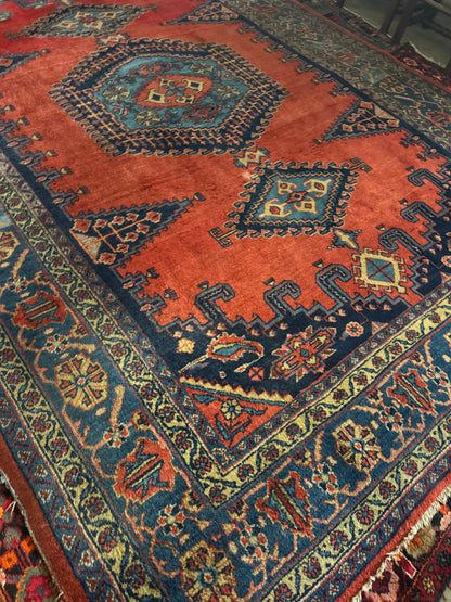 Persian rug navy and rust colours