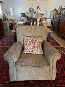 Armchair with feather filled cushion