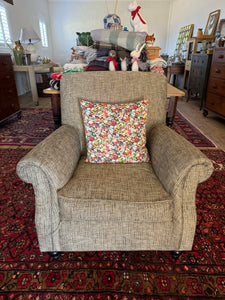 Armchair with feather filled cushion