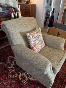 Armchair with feather filled cushion