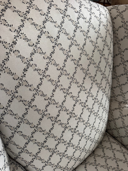 Wingback armchair with pretty upholstery