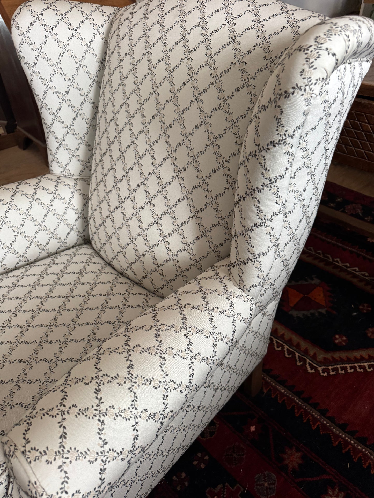 Wingback armchair with pretty upholstery