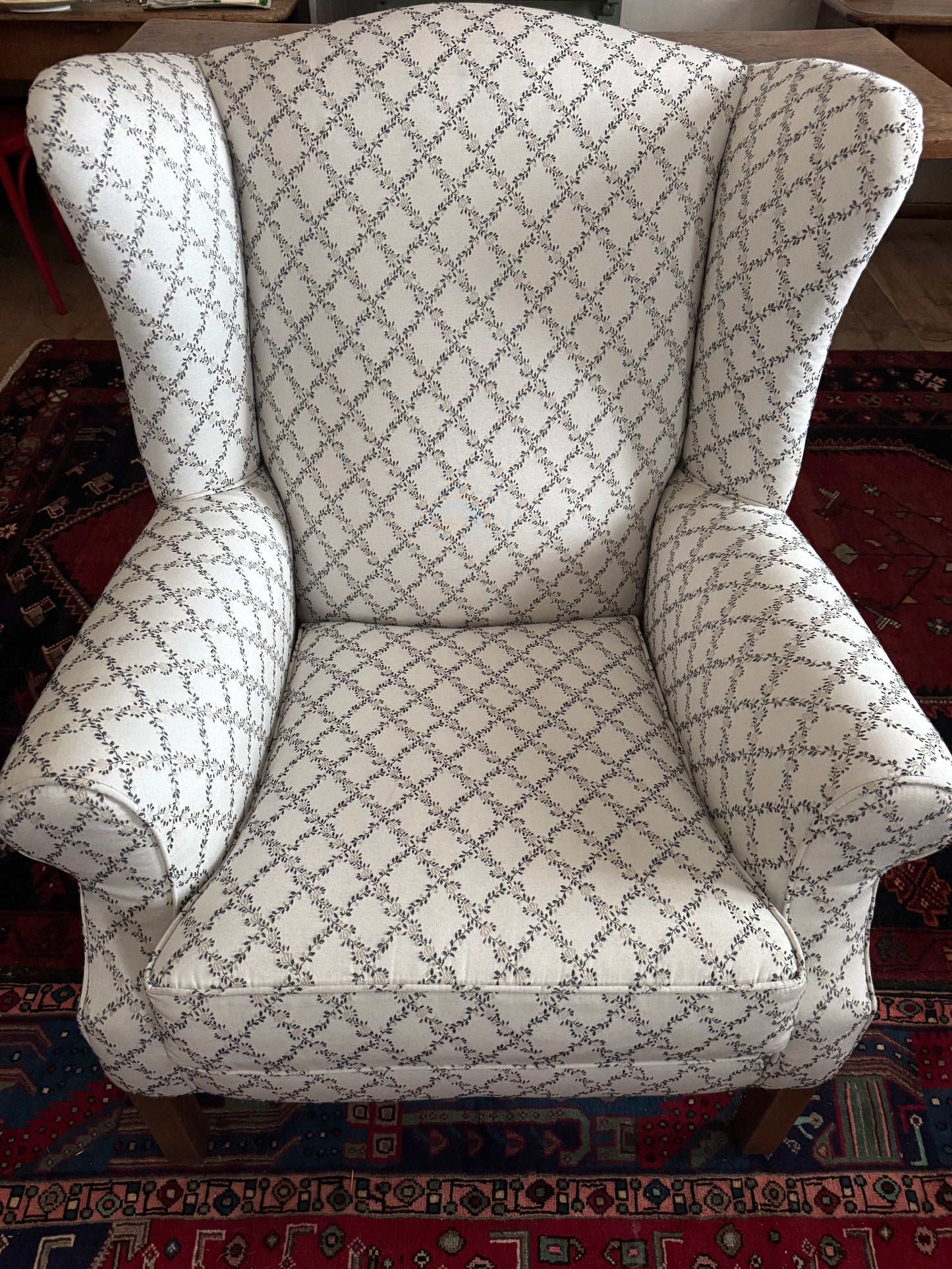 Wingback armchair with pretty upholstery