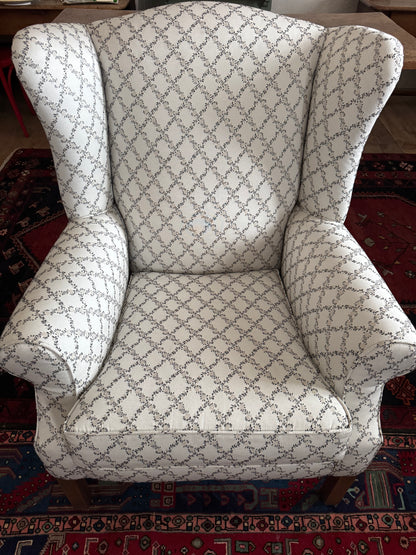 Wingback armchair with pretty upholstery