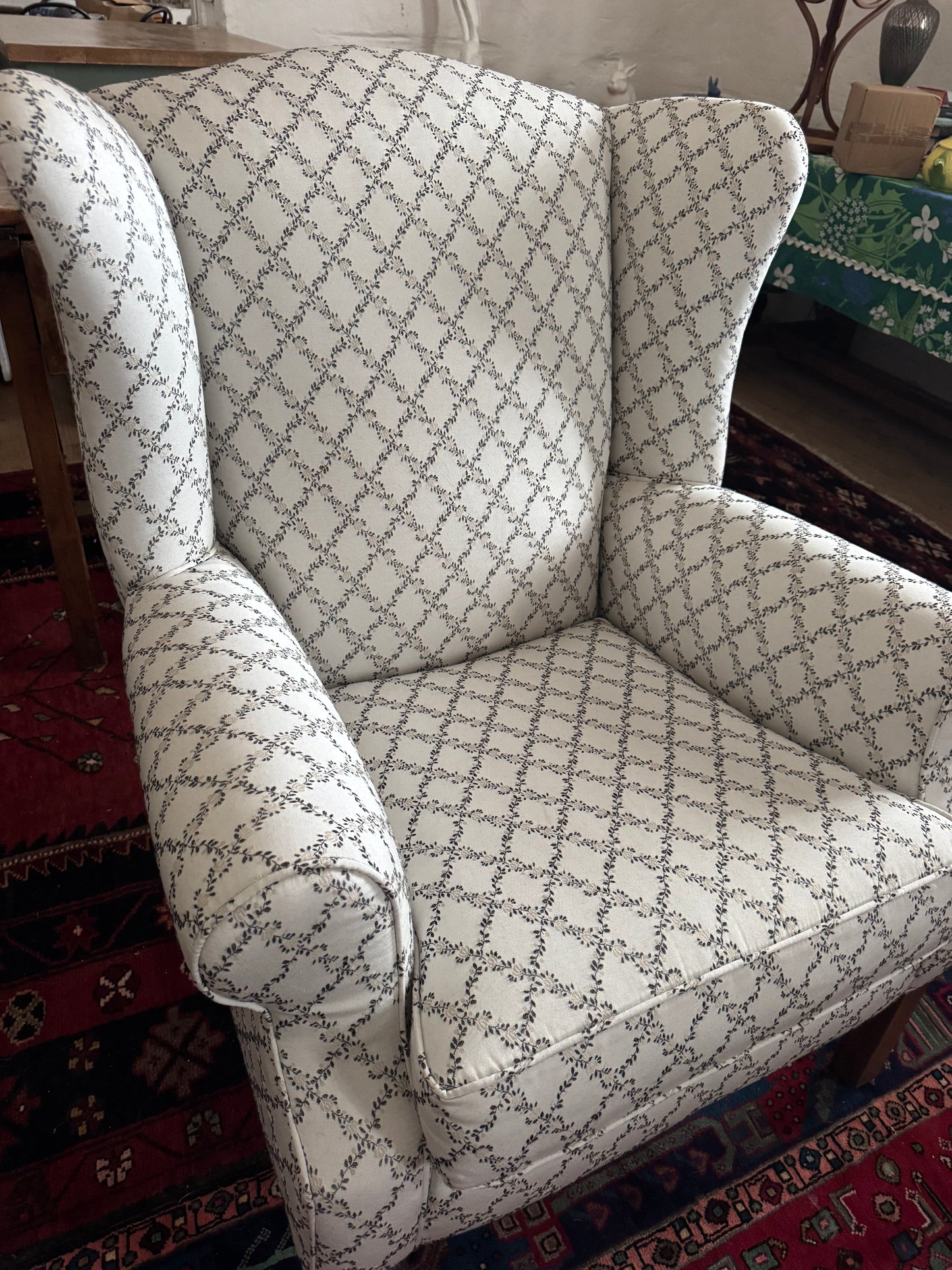 Wingback armchair with pretty upholstery