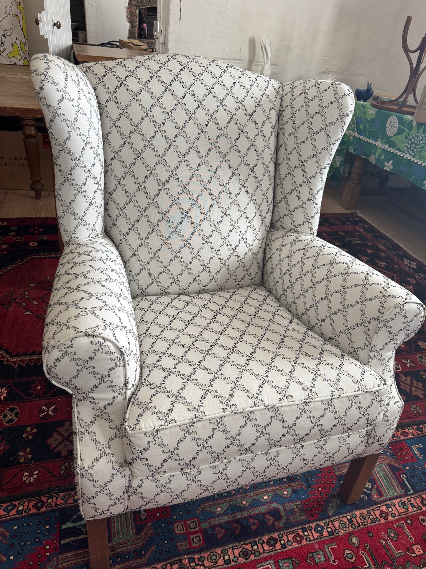 Wingback armchair with pretty upholstery