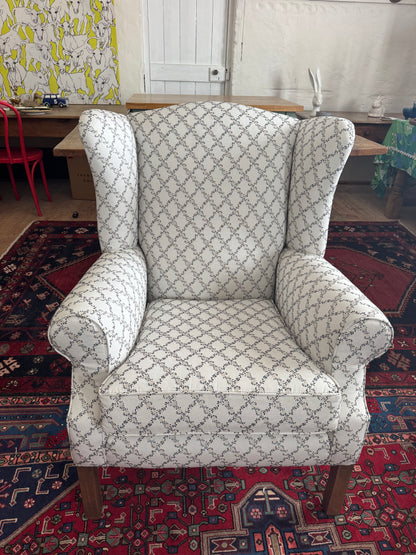 Wingback armchair with pretty upholstery