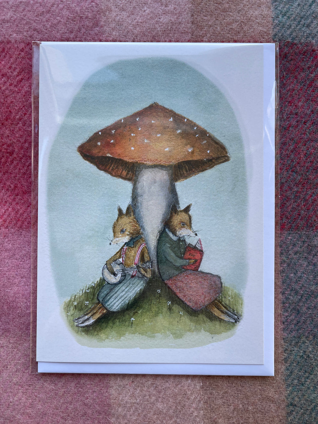 Foxes under Toadstool