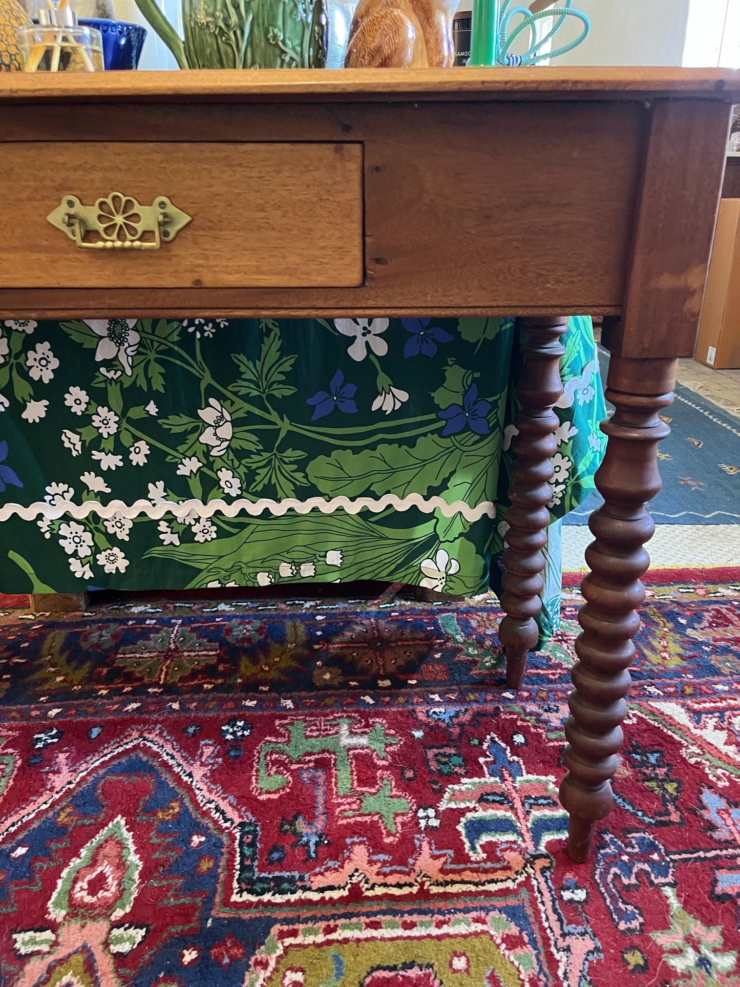 Antique hall table with bobbin legs and a drawer