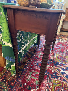 Antique hall table with bobbin legs and a drawer